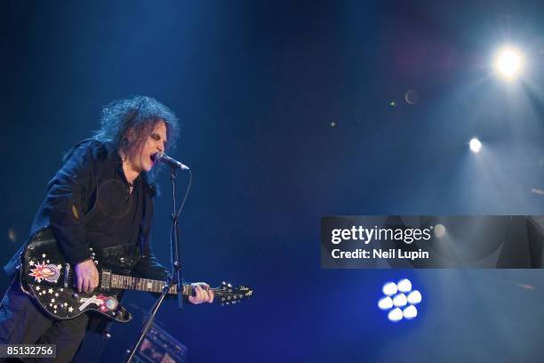 Robert Smith of The Cure performs at the O2 Arena on February 26, 2009 in London, England.