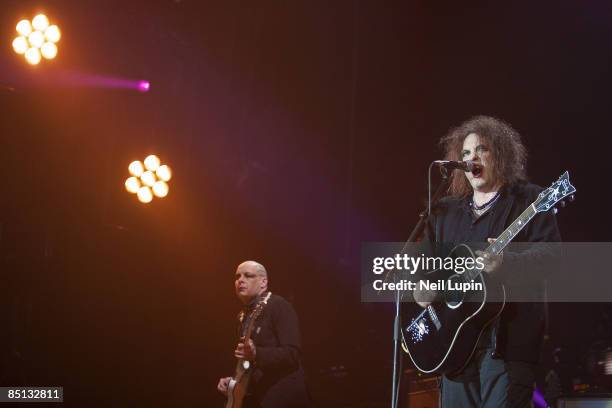 Porl Thompson and Robert Smith of The Cure perform at the O2 Arena on February 26, 2009 in London, England.