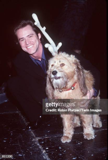New York, NY. Jim Carrey with Max the dog at the Toy Fair Whobilation, celebrating Universal Pictures'' and Imagine Entertainment's upcoming...