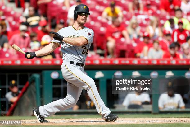 John Jaso of the Pittsburgh Pirates takes an at bat during the game against the Cincinnati Reds at Great American Ball Park on September 17, 2017 in...