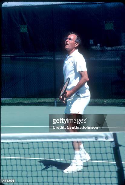 Vice President George Bush plays tennis August 1983 in Kennebunkport, ME. Bush is vacationing in Maine with his family.