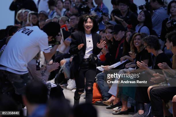 Anna Yang acknowledge the applause of the audience at the Annakiki show during Milan Fashion Week Spring/Summer 2018 on September 22, 2017 in Milan,...