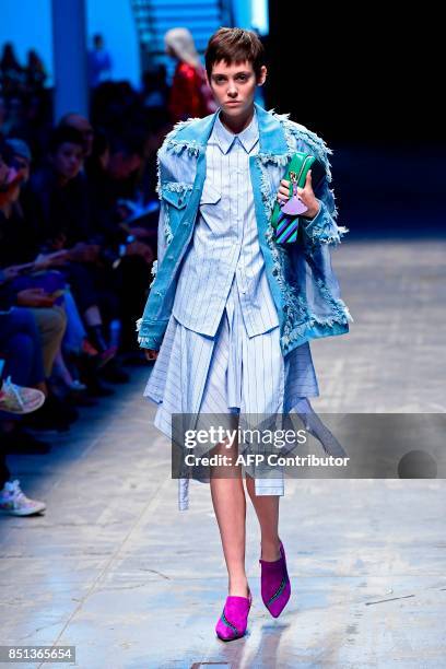 Model presents a creation for fashion house Annakiki during the Women's Spring/Summer 2018 fashion shows in Milan, on September 22, 2017. / AFP PHOTO...