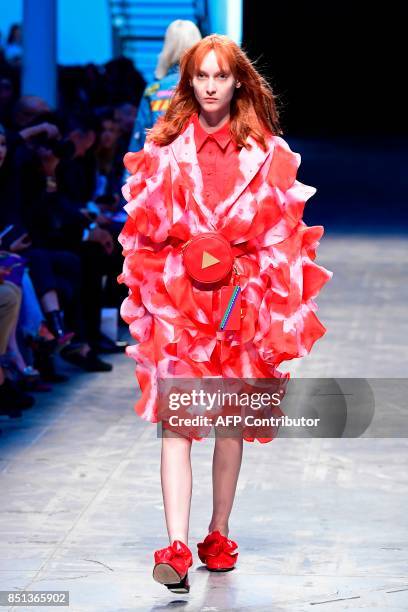 Model presents a creation for fashion house Annakiki during the Women's Spring/Summer 2018 fashion shows in Milan, on September 22, 2017. / AFP PHOTO...