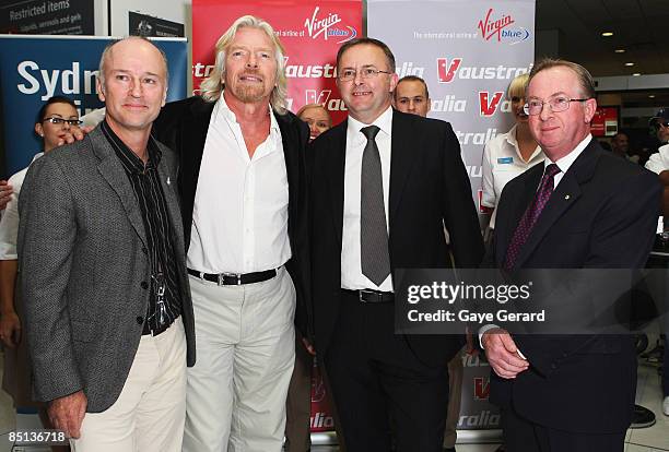 Sir Richard Branson, Brett Godfrey - CEO of Virgin Blue, Anthony Albanese - Minister for Transport and Regional Development, and guest pose during a...