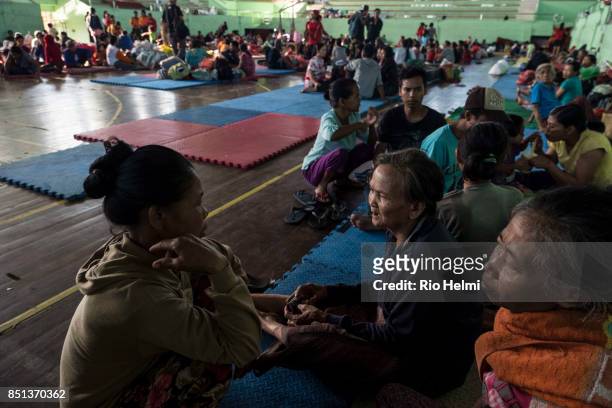 Evacuees from the southern slopes of the volcano Mt AGung in Bali in the temporary shelter at the sports stadium of Klungkung where this morning on...