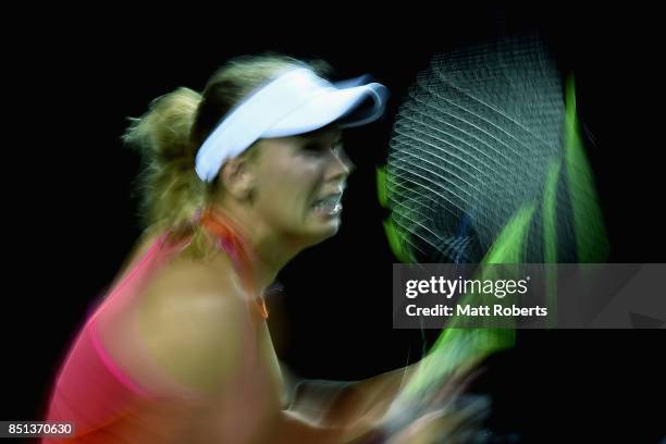 Caroline Wozniacki of Denmark plays a forehand in her quarter final match against Dominika Cibulkova of Slovakia during day five of the Toray Pan...