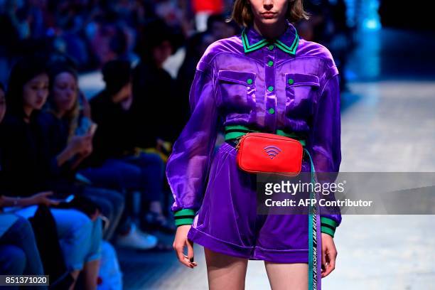 Model presents a creation for fashion house Annakiki during the Women's Spring/Summer 2018 fashion shows in Milan, on September 22, 2017. / AFP PHOTO...