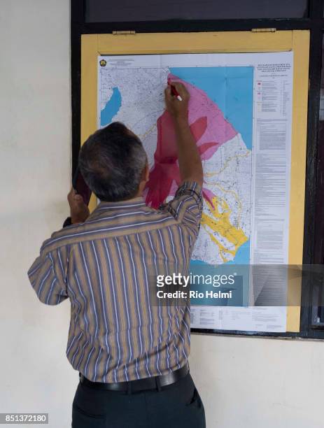 Geologists at work at the MT Agung monitoring station in Rendang, Bali. They have upped the warning to a level 3 "yellow" alert since the 18th of...