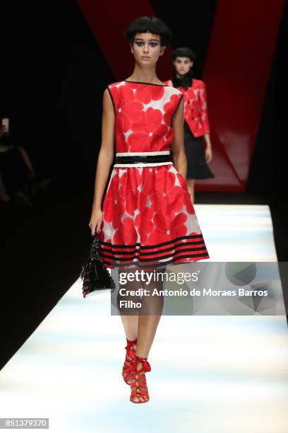 Model walks the runway at the Giorgio Armani show during Milan Fashion Week Spring/Summer 2018 on September 22, 2017 in Milan, Italy.