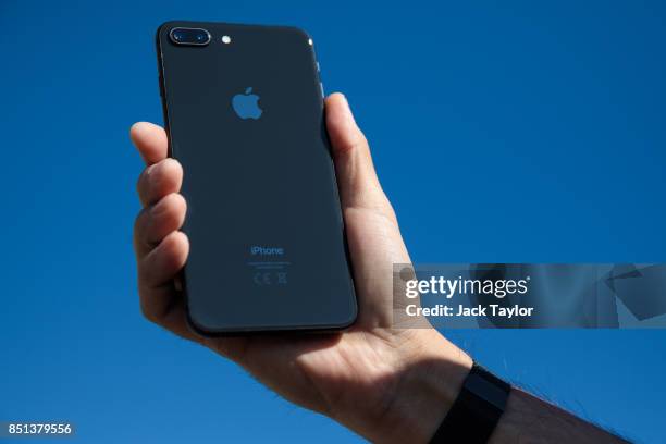 An iPhone 8 plus is held for a photograph on September 22, 2017 in London, England. Apple have today launched their new mobile phone the iPhone 8 and...