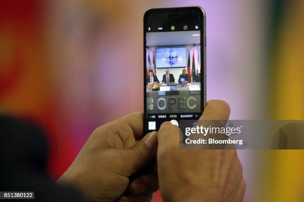 Alexander Novak, Russia's energy minister, left, Issam Almarzooq, Kuwait's oil minister, center, and Mohammed Barkindo, secretary general of the...