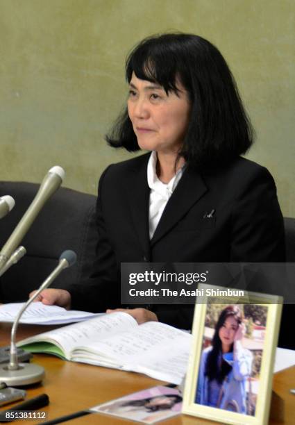 Yukimi Takahashi, whose daughter Matsuri killed herself in 2015 due to overwork, speaks to reporters during a press conference after a Tokyo Summary...