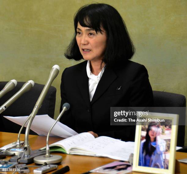 Yukimi Takahashi, whose daughter Matsuri killed herself in 2015 due to overwork, speaks to reporters during a press conference after a Tokyo Summary...