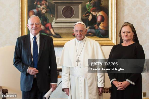 Pope Francis meets President of Peru Pedro Pablo Kuczynski and his wife Nacy Kuczynski during an audience at the Apostolic Palace on September 22,...