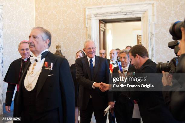 President of Peru Pedro Pablo Kuczynski and his wife Nacy Kuczynski. Flanked by the prefect of the papal household Georg Gaenswein. As they arrive at...