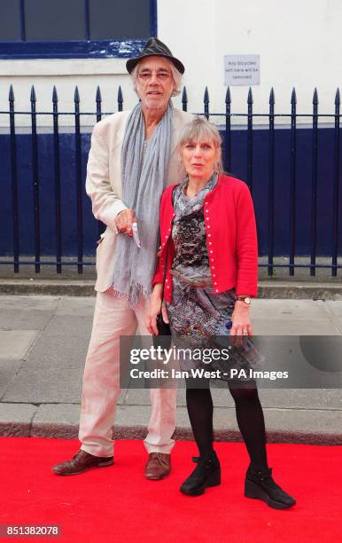 Roger Lloyd Pack and his wife Jehane Markham arriving at the opening night of Charlie and the Chocolate Factory at the Theatre Royal, Drury Lane in...