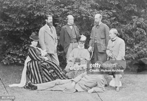 British Prime Minister Benjamin Disraeli with friends at his home, Hughenden Manor, Buckinghamshire, 1874. Left to right: Selina Weld-Forester,...