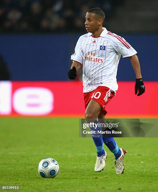 Dennis Aogo of Hamburg runs with the ball during the UEFA Cup Round of 32 second leg match between Hamburger SV and NEC Nijmegen at the HSH Nordbank...