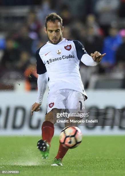 Fernando Belluschi of San Lorenzo kicks the ball during the second leg match between Lanus and San Lorenzo as part of the quarter finals of Copa...