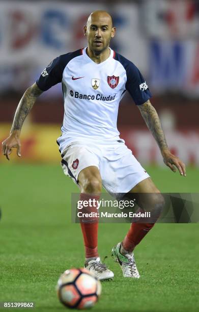 Juan Mercier of San Lorenzo drives the ball during the second leg match between Lanus and San Lorenzo as part of the quarter finals of Copa Conmebol...