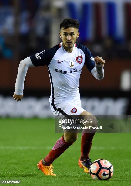 Gabriel Rojas of San Lorenzo drives the ball during the second leg match between Lanus and San Lorenzo as part of the quarter finals of Copa Conmebol...