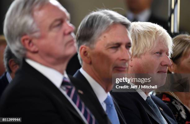 David Davies Secretary of State for Exiting the European Union, Chancellor of the Exchequer Philip Hammond and Foreign Secretary Boris Johnson listen...