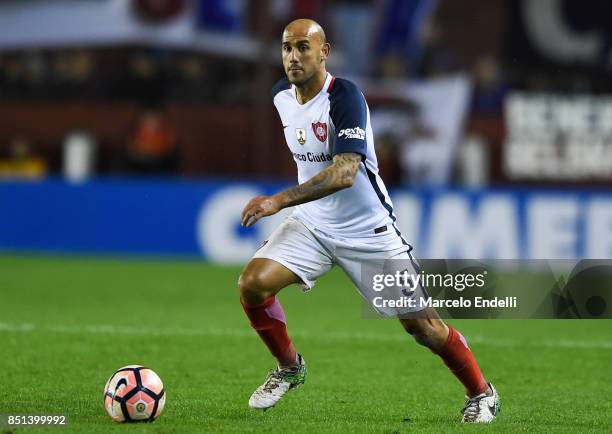 Juan Mercier of San Lorenzo drives the ball during the second leg match between Lanus and San Lorenzo as part of the quarter finals of Copa Conmebol...