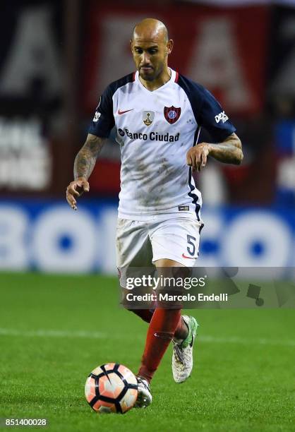 Juan Mercier of San Lorenzo drives the ball during the second leg match between Lanus and San Lorenzo as part of the quarter finals of Copa Conmebol...