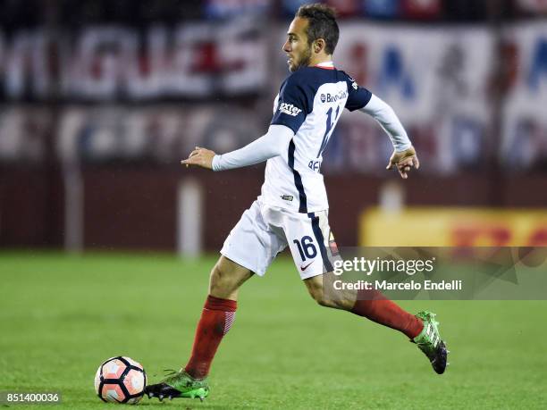 Fernando Belluschi of San Lorenzo drives the ball during the second leg match between Lanus and San Lorenzo as part of the quarter finals of Copa...