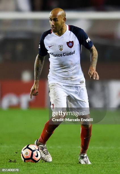 Juan Mercier of San Lorenzo drives the ball during the second leg match between Lanus and San Lorenzo as part of the quarter finals of Copa Conmebol...