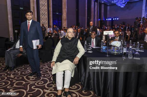 Arun Jaitley, India's finance minister, center, sits in the audience during the Bloomberg India Economic Forum in Mumbai, India, on Friday, Sept. 22,...