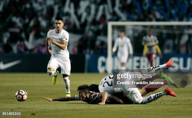 Lucas of Fluminense and Lucas de Lima of LDU Quito fight for the ball during a second leg match between LDU Quito and Fluminense as part of round of...