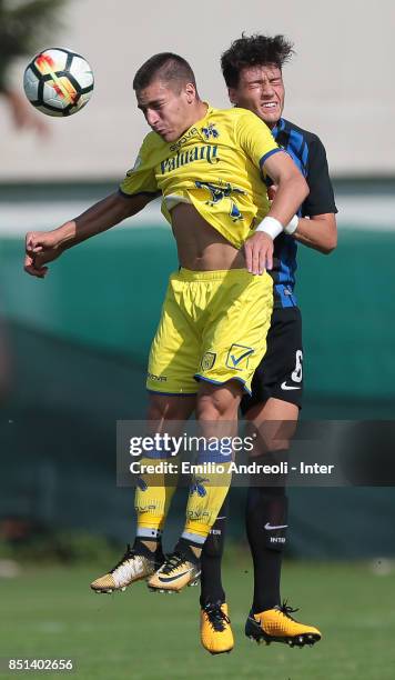 Davide Bettella of FC Internazionale Milano jumps for the ball during the Serie A Primavera match between FC Internazionale U19 and Chievo Verona U19...