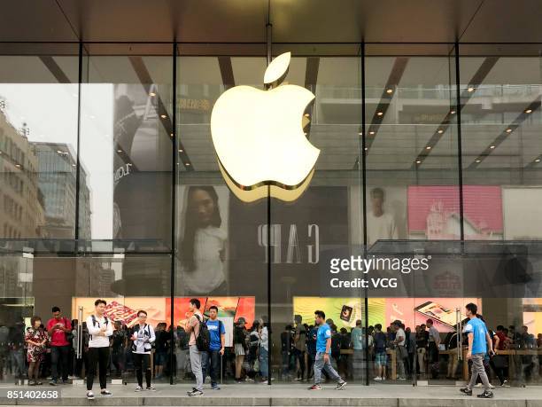 Customers are seen at the Apple store of Nanjing Eat Road on September 22, 2017 in Shanghai, China. Apple's iPhone 8 and iPhone 8 Plus went on sale...