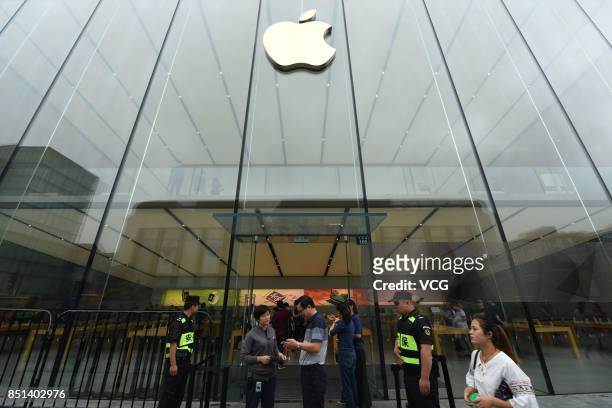 Customers are seen at the Apple store on September 22, 2017 in Hangzhou, Zhejiang Province of China. Apple's iPhone 8 and iPhone 8 Plus went on sale...
