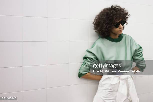 Model is seen backstage ahead of the Sportmax show during Milan Fashion Week Spring/Summer 2018on September 22, 2017 in Milan, Italy.
