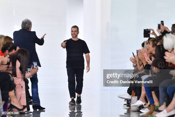 Designer Paul Surridge and Roberto Cavalli walk the runway at the Roberto Cavalli show during Milan Fashion Week Spring/Summer 2018 on September 22,...