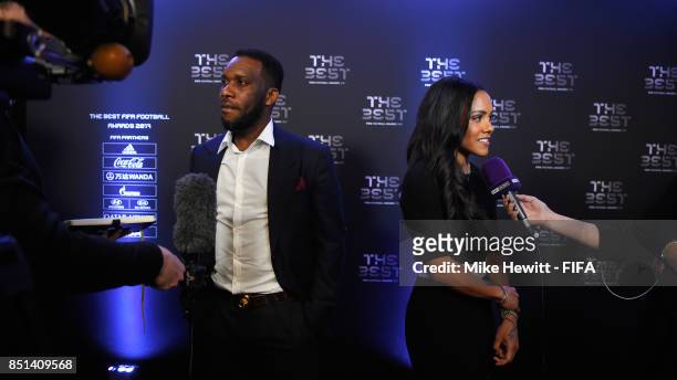 Legends Jay Jay Okocha and Alex Scott are interviewed during The Best FIFA Football Awards 2017 press conference at The Bloomsbury Ballroom on...