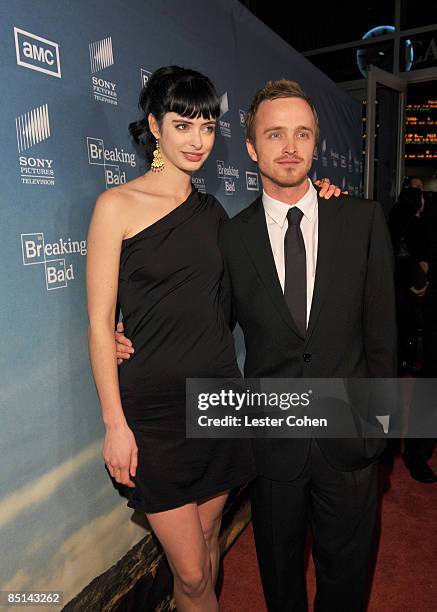 Actors Krysten Ritter and Aaron Paul arrive at the season two premiere of "Breaking Bad" held at Arclight Cinemas on February 26, 2009 in Hollywood,...