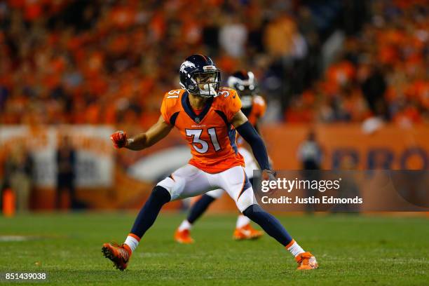 Strong safety Justin Simmons of the Denver Broncos pivots during a play against the Los Angeles Chargers at Sports Authority Field at Mile High on...