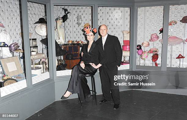 Erin O'Connor poses with milliner Stephen Jones at the Victoria and Albert Museum on February 20, 2009 in London, England.