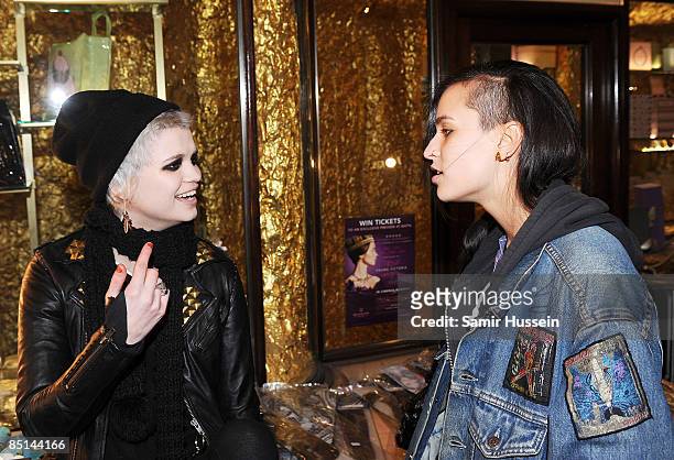 Alice Dellal and Pixie Geldof chat backstage ahead of the PPQ fashion show as part of a/w London Fashion Week at Burlington Arcade on February 22,...