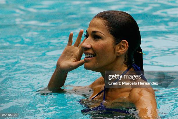 Venezuelan model and actress Catherine Fulop is the Queen of the 50th International Song Festival during a photo shoot in the pool of a hotel on...