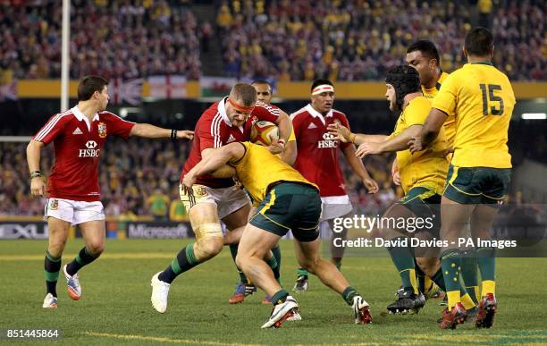 British and Irish Lions' Jamie Heaslip in action with Australia's Michael Hooper