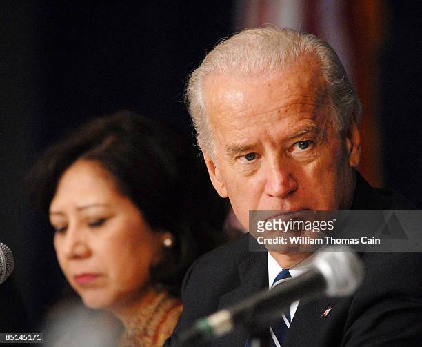 Vice President Joseph Biden listens to a panel discussion with Department of Labor Secretary Hilda Solis as he addresses the meeting of the First...