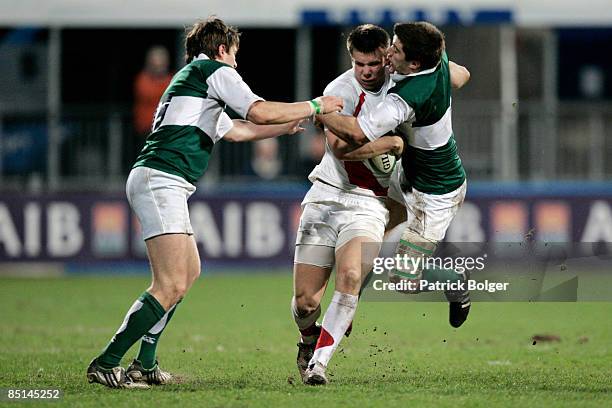 Samuel Smith of England is tackled by Darragh Kavanagh and Philip Brophy of Ireland during the Ireland Clubs XV and the England Counties XV match at...