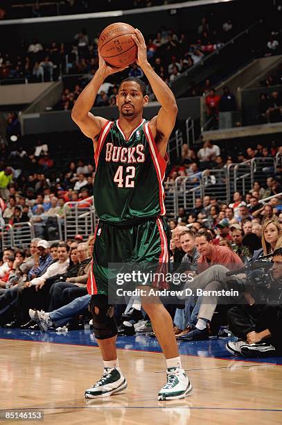 Charlie Bell of the Milwaukee Bucks looks for an open pass during the game against the Los Angeles Clippers on January 17, 2009 at Staples Center in...