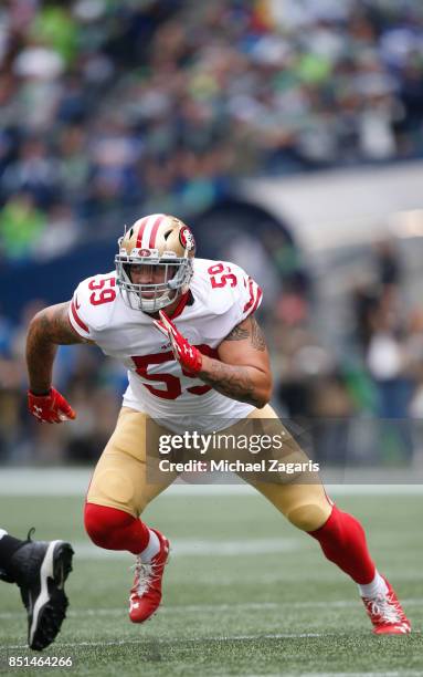 Aaron Lynch of the San Francisco 49ers rushes the quarterback during the game against the Seattle Seahawks at CenturyLink Field on September 17, 2017...