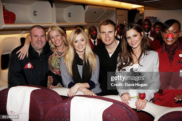 Chris Moyles, Denise Van Outen, Fearne Cotton, Gary Barlow and Cheryl Cole pose after boarding a Kenya Airlines flight to Tanzania to climb Mount...